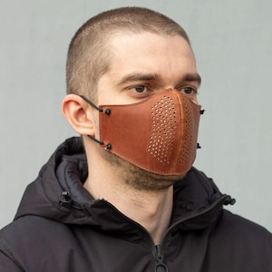 Maske aus Leder mit Papierfilter. Schutzmaske. Unisex Schwarze Mundmaske. NICHT MEDIZINISCHE.