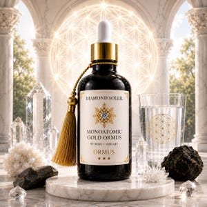 May include: A dark glass bottle with a gold dropper and tassel, labelled "Monoatomic Gold Ormus" by Diamond Soleil. The image includes clear quartz crystals, a glass of water, and a decorative background.