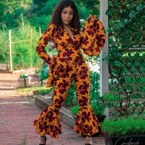 Queen B Jump Suit .(XS )(Red Flower)