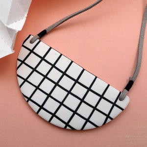 White grid bib necklace image 2