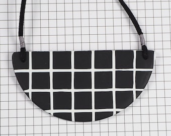 Black grid bib necklace