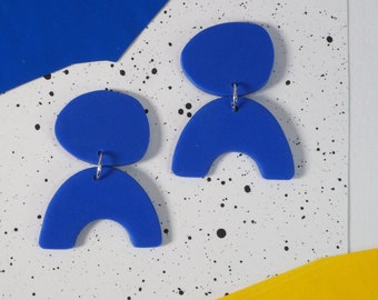 Cobalt blue statement dangly arc earrings. Blue polymer clay dangle earrings