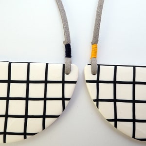 White grid bib necklace image 4