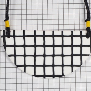 White grid bib necklace image 1