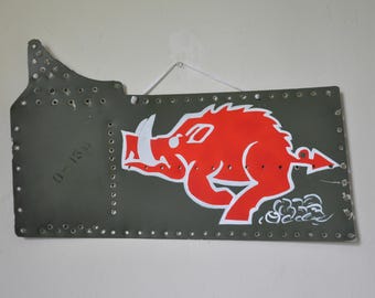 Bell Huey razor back nose art on original helicopter metal and paint