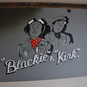 WW2  de Havilland Mosquito 1940’s airplane panel with Blackie and Kirk Nose Art