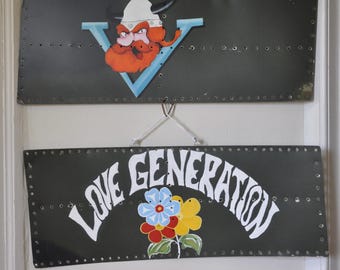 Bell Huey hand painted nose art on original helicopter metal