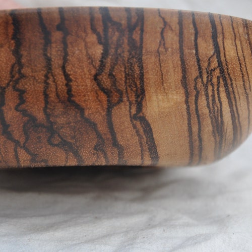 Bowl made from an Airspeed shops Horsa relic mounted in Zebrano wood