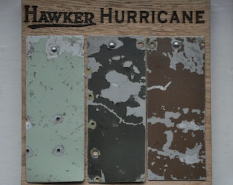 WW2 Hawker Hurricane aircraft relics with original paint mounted on Oak panel