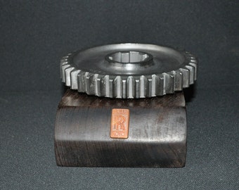 Rolls Royce Car engine gear on hard wood base