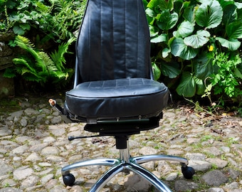Pilot seat from a 1950 Dove /Heron passenger airliner in black leather