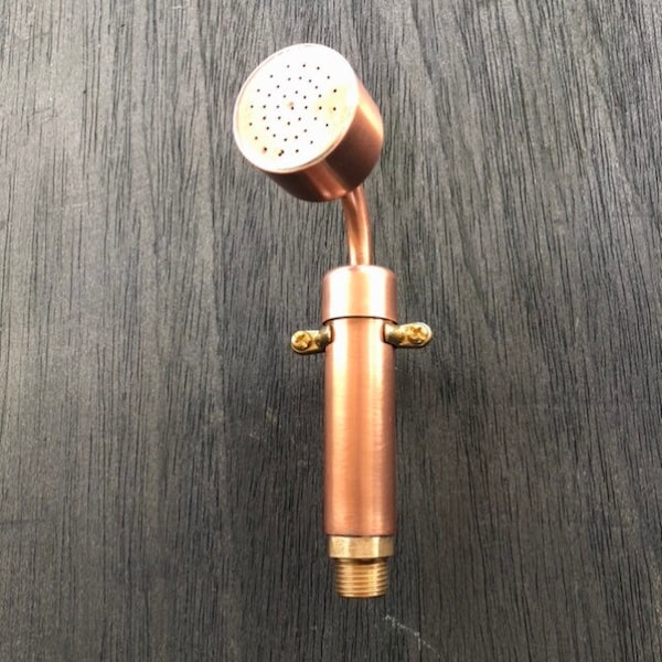 Solid copper hand held shower head