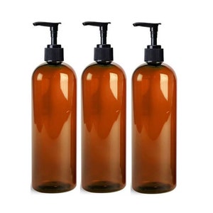 May include: Three amber glass bottles with black pump tops. The bottles are empty and ready to be filled with your favorite liquids.