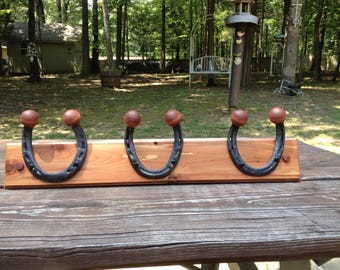 Horseshoe coat, clothes rack