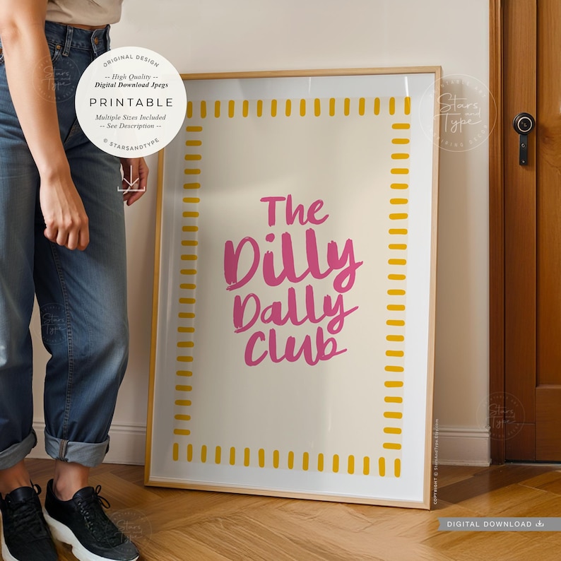 printable wall art. a trendy fun quote with the words: 'the dilly dally club' written in a funky cool font in a pink colour on a neutral beige background with a pink and  white boarder. this would suit any home interior space. multiple sizes are included. this is a digital download.