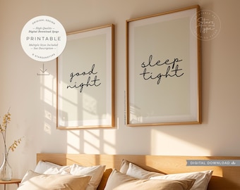 May include: Two framed prints with a beige background and black text. The print on the left says "good night" and the print on the right says "sleep tight".