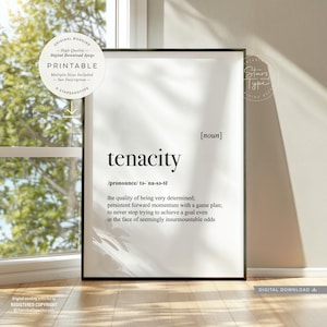May include: A framed black and white print with the definition of "tenacity". The word is in a bold, sans-serif font, with the pronunciation and definition below. The print includes the text "PRINTABLE" and "DIGITAL DOWNLOAD".