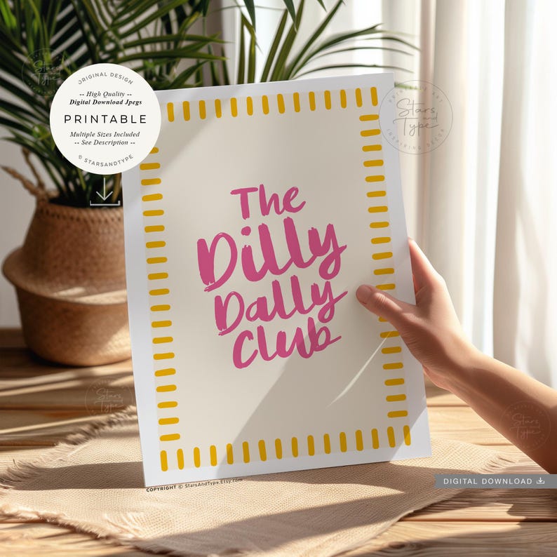 printable wall art. a trendy fun quote with the words: 'the dilly dally club' written in a funky cool font in a pink colour on a neutral beige background with a pink and  white boarder. this would suit any home interior space. multiple sizes are included. this is a digital download.