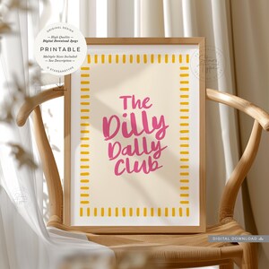 printable wall art. a trendy fun quote with the words: 'the dilly dally club' written in a funky cool font in a pink colour on a neutral beige background with a pink and  white boarder. this would suit any home interior space. multiple sizes are included. this is a digital download.