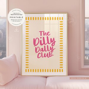 printable wall art. a trendy fun quote with the words: 'the dilly dally club' written in a funky cool font in a pink colour on a neutral beige background with a pink and  white boarder. this would suit any home interior space. multiple sizes are included. this is a digital download.