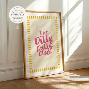 printable wall art. a trendy fun quote with the words: 'the dilly dally club' written in a funky cool font in a pink colour on a neutral beige background with a pink and  white boarder. this would suit any home interior space. multiple sizes are included. this is a digital download.