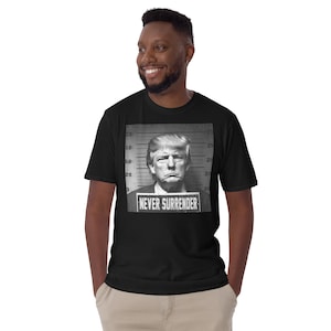Trump Mugshot T-Shirt - Donald Trump Mug Shot T-Shirt - Trump Mugshot - Trump Mugshot T-Shirts for Sale - KellyDoesItAll