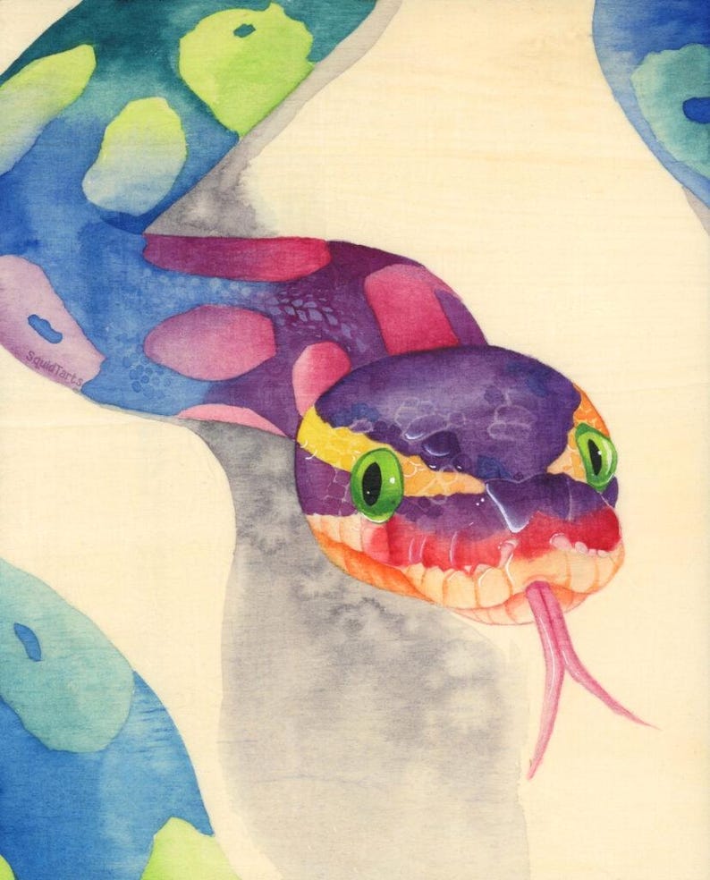 Peut inclure: Peinture &agrave; l'aquarelle d'un serpent color&eacute; avec une t&ecirc;te violette, des taches roses et une langue rose fourchue. Le corps du serpent est bleu avec des accents verts et roses. Les yeux du serpent sont verts et jaunes.