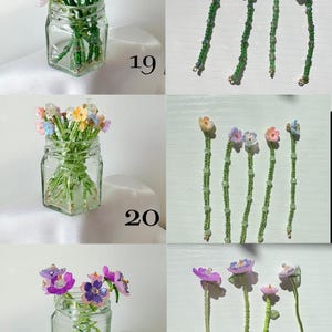 May include: A collection of handcrafted beaded flower stems featuring delicate petals in shades of pink, purple, blue, and orange, attached to long green beaded stalks. The stems are displayed in clear glass jars, labeled with numbers 19, 20, and 21.