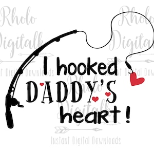 May include: Black fishing rod graphic with the text "I hooked DADDY'S heart!" in a bold, playful font. Red hearts accent the text, and a larger heart hangs from the fishing line. A digital download.