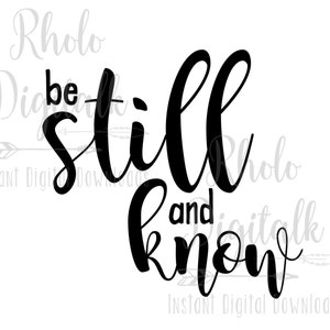 May include: Black and white calligraphy design with the text "be still and know".
