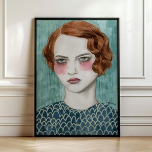 May include: A framed portrait illustration of a person with wavy auburn hair, pale skin, and pink-tinted cheeks. The subject wears a dark blue top with a repeating scalloped pattern against a vertical teal striped background. Signed by the artist.