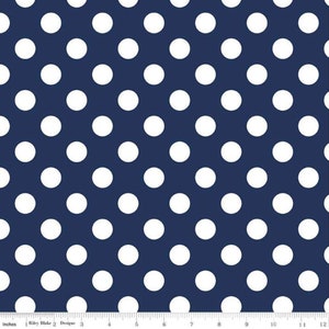 May include: Navy blue fabric with a white polka dot pattern. The dots are evenly spaced and cover the entire surface of the fabric.