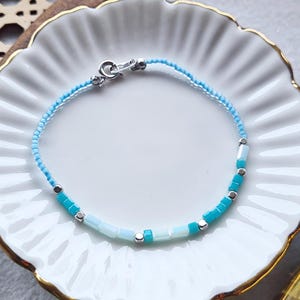 Personalisierbar: Morsecode Armband " Calling You " silber türkis hellblau Geschenk Name Morse Code Ascii Freundschaftsarmband Perlenarmband