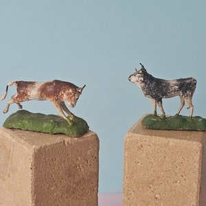Antique Miniature Clay Bulls