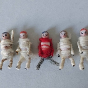 Poupées miniatures antiques en biscuit et en fil de fer