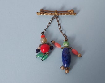 Antique Glass Bead Doll Brooch Rintintin and Nannette