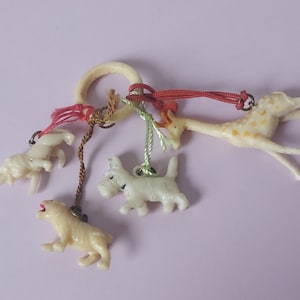 Celluloid Cracker Charms on Ring