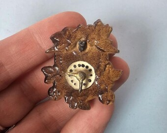 Reloj de cuco miniatura antiguo