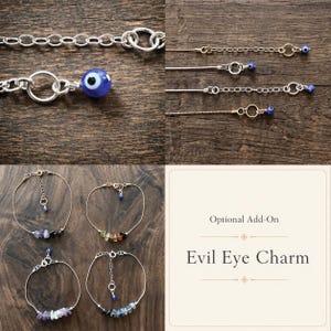 May include: A collection of silver and gold-toned bracelets and chains, some with small blue evil eye charms. Several bracelets feature colorful gemstone accents. The image also includes text that reads "Optional Add-On Evil Eye Charm."