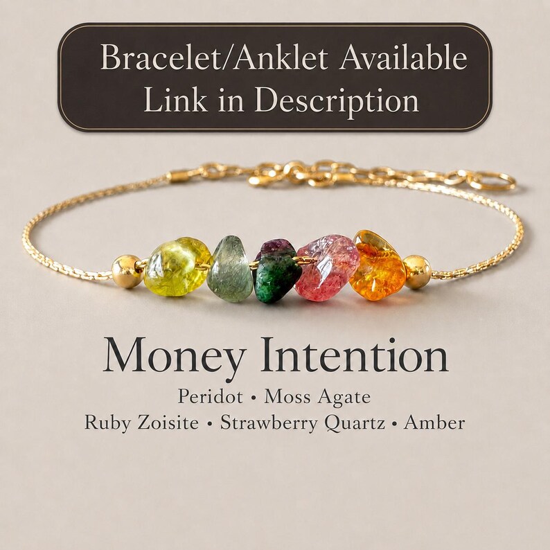 May include: A gold chain bracelet featuring five raw, multi-colored gemstones: peridot, moss agate, ruby zoisite, strawberry quartz, and amber. The text reads: Bracelet/Anklet Available Link in Description, Money Intention, Peridot, Moss Agate, Ruby Zoisite, Strawberry Quartz, Amber.