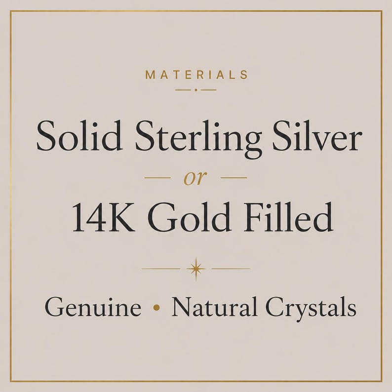 May include: A square graphic with a light beige background and a thin gold border. The text reads: MATERIALS, Solid Sterling Silver or 14K Gold Filled, and Genuine Natural Crystals. The design includes small gold lines and a star icon.