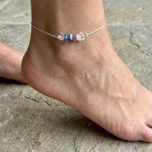 Minimalist sterling silver anklet with raw gemstone chip beads in a rainbow mix, delicate ankle bracelet with a clean modern jewelry look