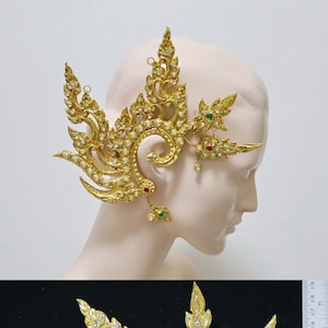 Handmade anceint ornaments for Thai/ Khmer dancing costume, made of paper, rice flour, imitation stones and gold leaf. Nonmetal ear cuffs