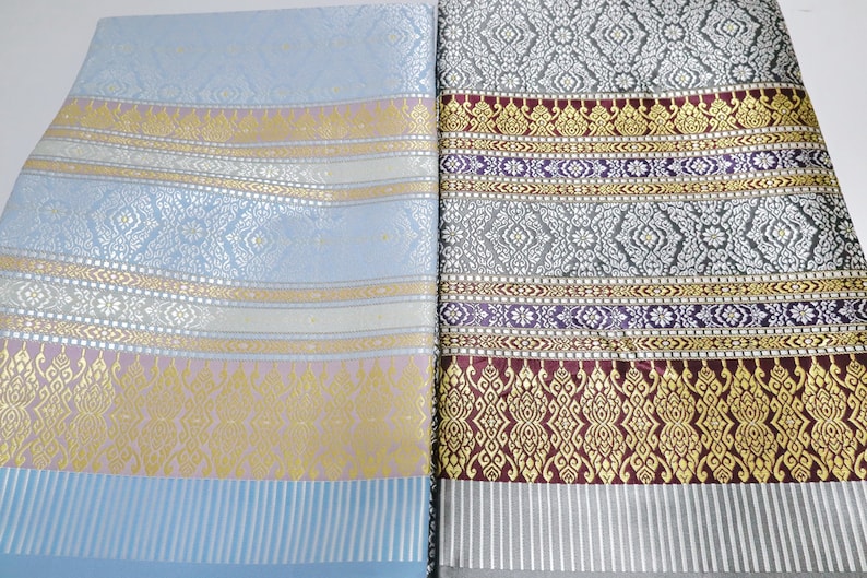 Guldbrokad syntetiskt sidentyg: Thailändsk Lanna-design, osydd polyestertextil, osydd tyg bild 1
