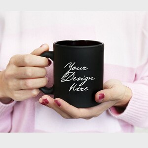 Woman holding black mug mockup, Mockup of Black coffee mug in hands, Black Mug Stock Photo, Female hands holding black coffee cup, 840