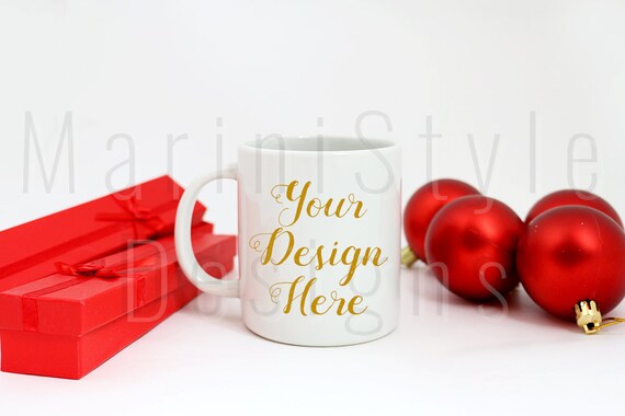Christmas Product Mockup Of Coffee Mug On Red Ornaments