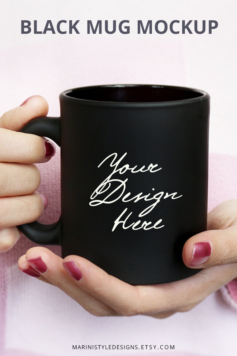 Woman holding black mug mockup Mockup of Black coffee mug