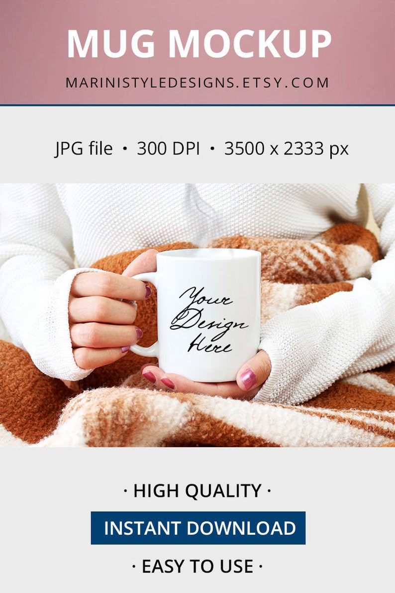 May include: A white mug held by a person, with the text "Your Design Here" in black script. The mug is set against a cozy backdrop of a white sweater and a brown and white patterned blanket. The image also includes text that says "MUG MOCKUP".