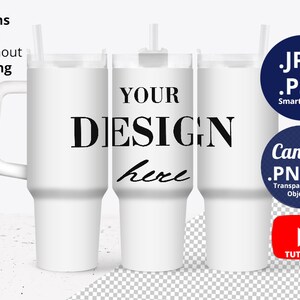 May include: Mockup of a white travel mug with a handle and a straw. The mug has the text "YOUR DESIGN here" printed on it. The image includes two versions of the mug, one with a metal ring and one without.