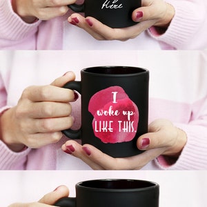 May include: Black mug mockup with three different designs. The first mug has the text "Your Design Here". The second mug has the text "I woke up LIKE THIS" over a pink watercolor design. The third mug has the text "but first COFFEE".
